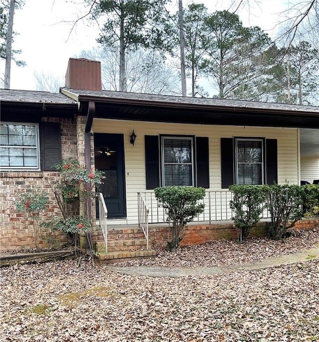 ranch-style house featuring a porch