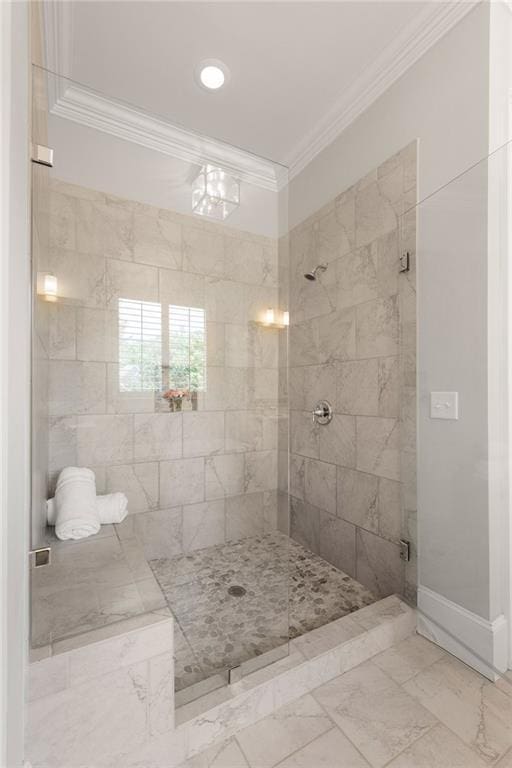 5330 Lake Redwine Cv NW, Acworth, GA 30101 - full bathroom featuring crown molding, marble look tile flooring, and a tile shower