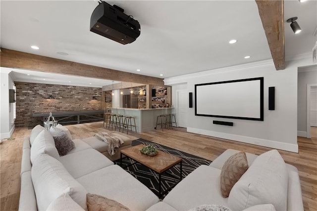 5330 Lake Redwine Cv NW, Acworth, GA 30101 - home theater room featuring recessed lighting, wood finished floors, baseboards, beamed ceiling, and brick wall