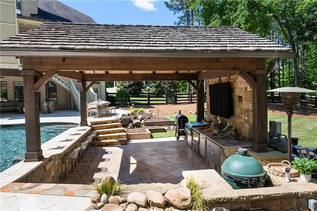 5330 Lake Redwine Cv NW, Acworth, GA 30101 - view of patio with fence, an outdoor pool, area for grilling, and stairway