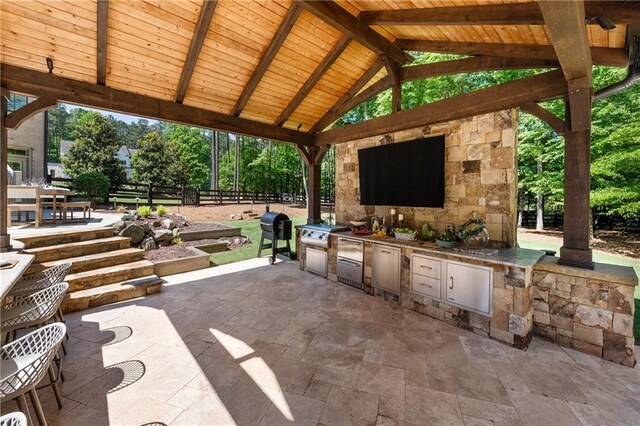 5330 Lake Redwine Cv NW, Acworth, GA 30101 - view of patio / terrace with a gazebo, an outdoor kitchen, fence, and a grill