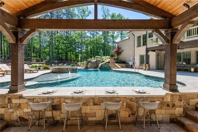 5330 Lake Redwine Cv NW, Acworth, GA 30101 - swimming pool featuring a patio and a water slide