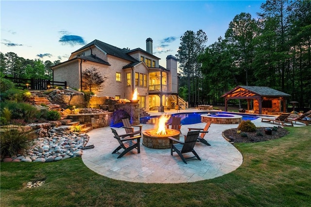 5330 Lake Redwine Cv NW, Acworth, GA 30101 - view of pool with an outdoor fire pit, a gazebo, a yard, and a patio