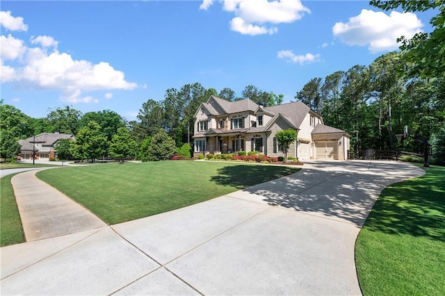 5330 Lake Redwine Cv NW, Acworth, GA 30101 - view of front facade with concrete driveway, a front lawn, and an attached garage