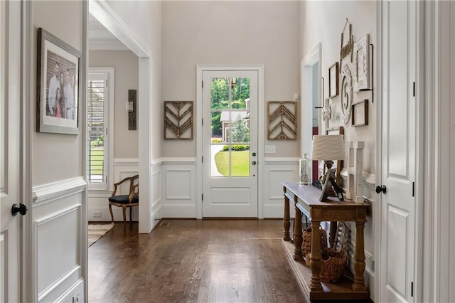 5330 Lake Redwine Cv NW, Acworth, GA 30101 - entryway featuring plenty of natural light, a decorative wall, wainscoting, and wood finished floors