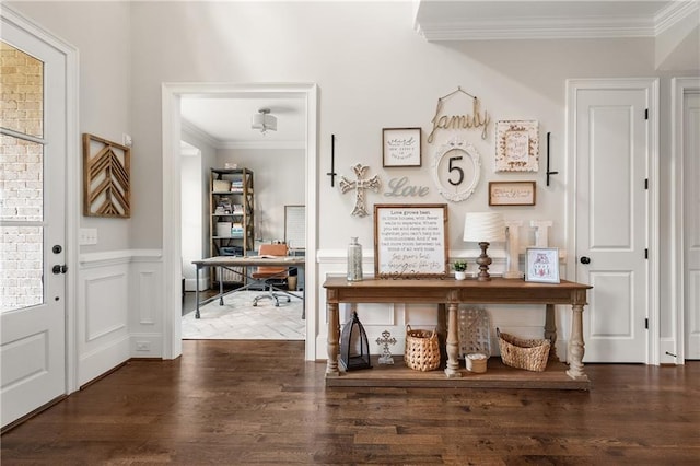 5330 Lake Redwine Cv NW, Acworth, GA 30101 - entryway featuring crown molding, dark wood finished floors, and wainscoting
