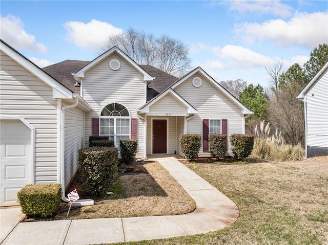 traditional home featuring a front yard