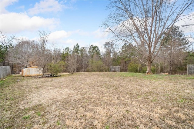 view of yard with fence