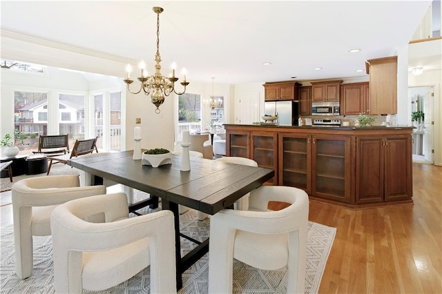 3711 Spinnaker Cir, Alpharetta, GA 30005 - dining space featuring light wood-type flooring, a chandelier, and recessed lighting
