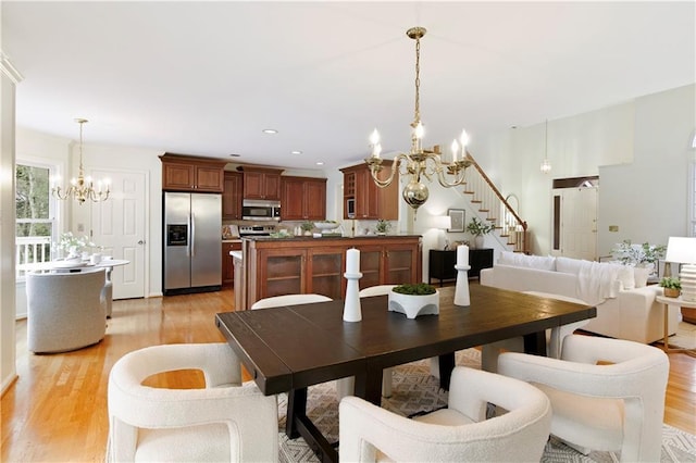 3711 Spinnaker Cir, Alpharetta, GA 30005 - dining area featuring a chandelier, stairs, light wood finished floors, and recessed lighting