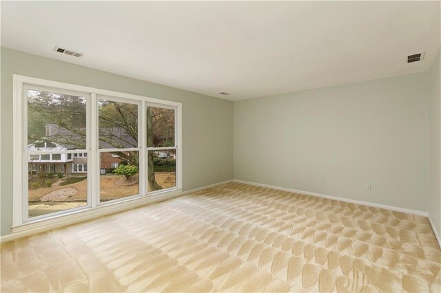 3711 Spinnaker Cir, Alpharetta, GA 30005 - empty room featuring light carpet and baseboards