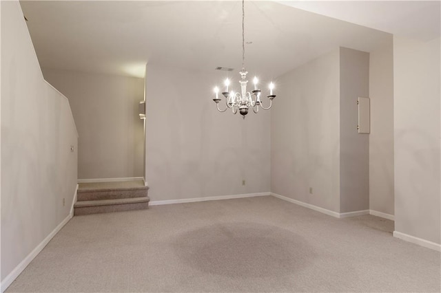 3711 Spinnaker Cir, Alpharetta, GA 30005 - unfurnished dining area with a chandelier, carpet, baseboards, and stairs