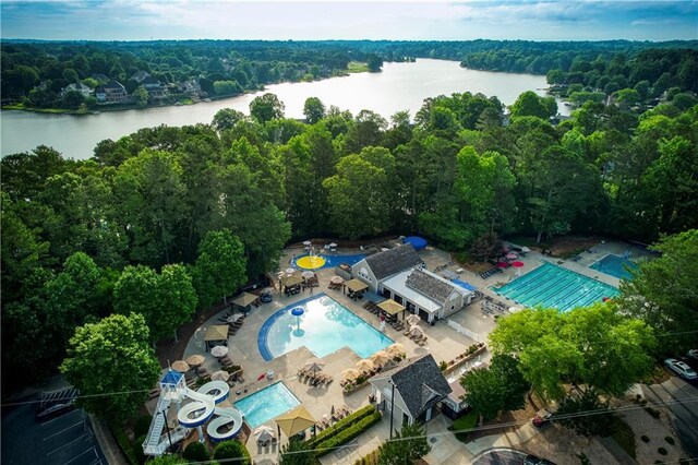 3711 Spinnaker Cir, Alpharetta, GA 30005 - drone / aerial view of a pool area, a large body of water, and a forest