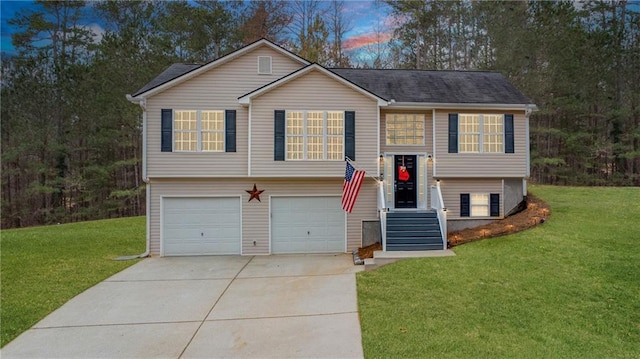 266 Carthage Blvd, Rockmart, GA 30153 - bi-level home featuring driveway, an attached garage, and a front lawn