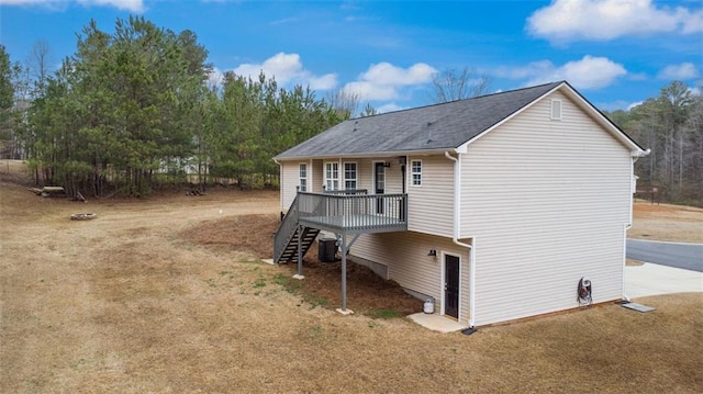 view of property exterior featuring stairs