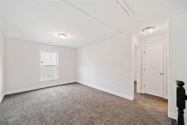 unfurnished room with carpet floors