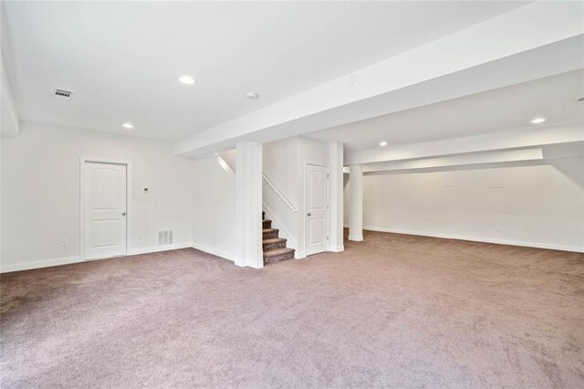 basement featuring carpet floors