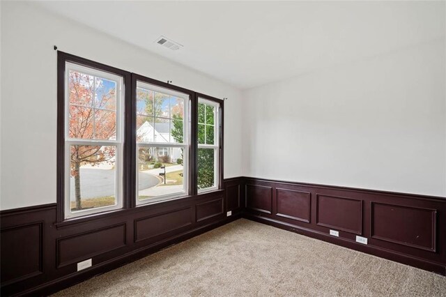 view of carpeted spare room