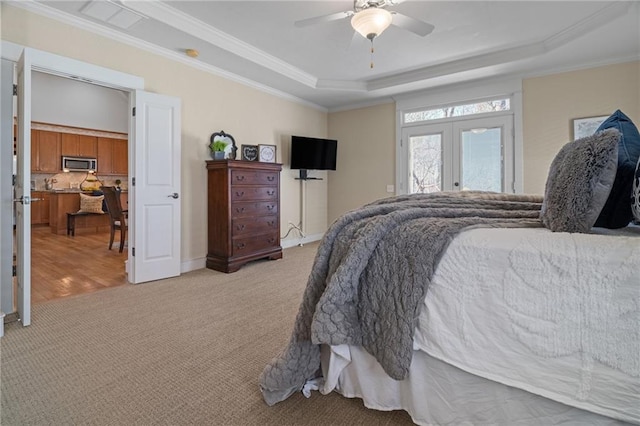 216 Crescent Moon Way, Canton, GA 30114 - bedroom with light carpet, crown molding, french doors, and a raised ceiling