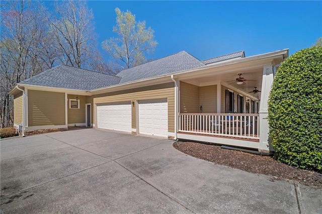 216 Crescent Moon Way, Canton, GA 30114 - view of home's exterior with concrete driveway, roof with shingles, an attached garage, ceiling fan, and a porch