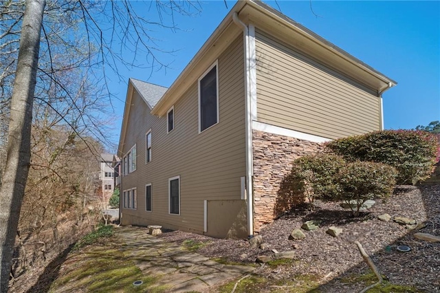 216 Crescent Moon Way, Canton, GA 30114 - view of home's exterior with stone siding