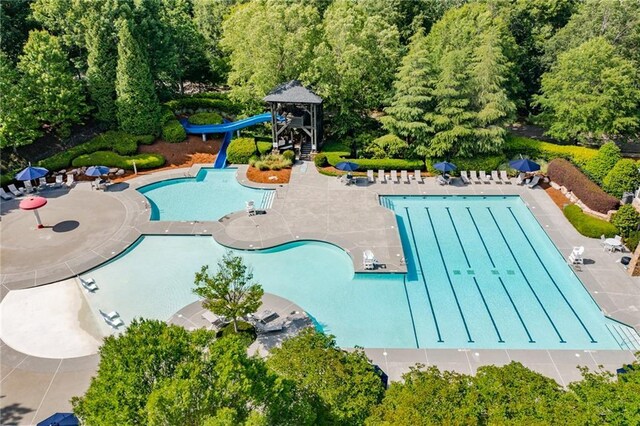 216 Crescent Moon Way, Canton, GA 30114 - community pool with a water slide and a patio area