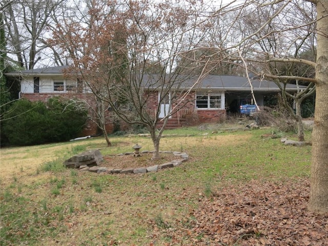 view of yard featuring an attached carport