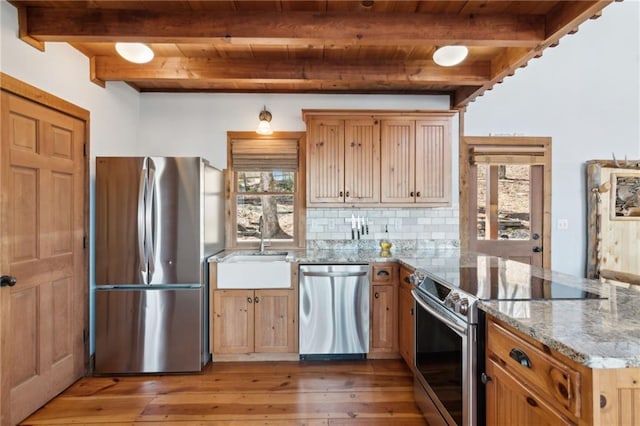 kitchen with wooden ceiling, stainless steel appliances, a peninsula, tasteful backsplash, and beamed ceiling