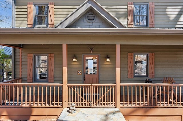 entrance to property with covered porch