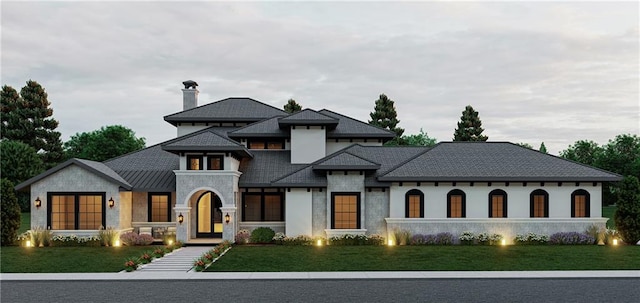 view of front of home featuring a front lawn