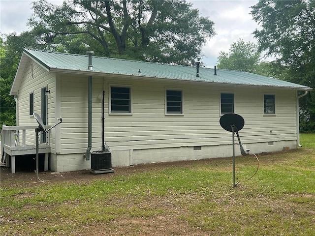 319 Gordon St, Rockmart, GA 30153 - view of home's exterior with a yard, metal roof, and crawl space