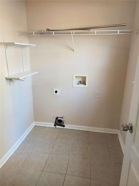 clothes washing area featuring washer hookup, electric dryer hookup, and tile patterned floors