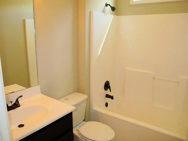 full bathroom featuring vanity, toilet, and bathing tub / shower combination