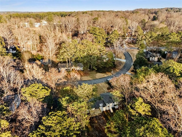 aerial view with a wooded view