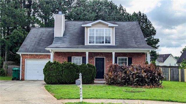 4707 Golod Way, Lithonia, GA 30038 - view of front of home featuring an attached garage, brick siding, driveway, and a chimney
