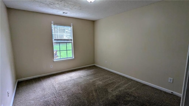 4707 Golod Way, Lithonia, GA 30038 - carpeted spare room with a textured ceiling and baseboards
