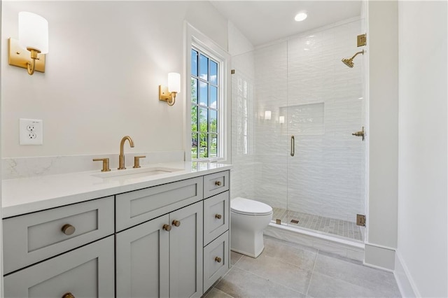 full bath with vanity, a stall shower, recessed lighting, tile patterned flooring, and toilet