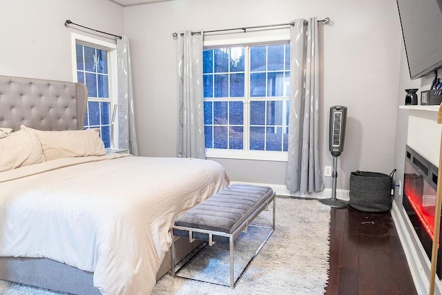 bedroom featuring wood-type flooring