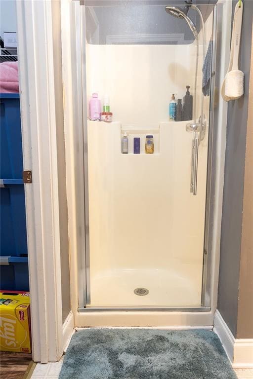 bathroom featuring walk in shower