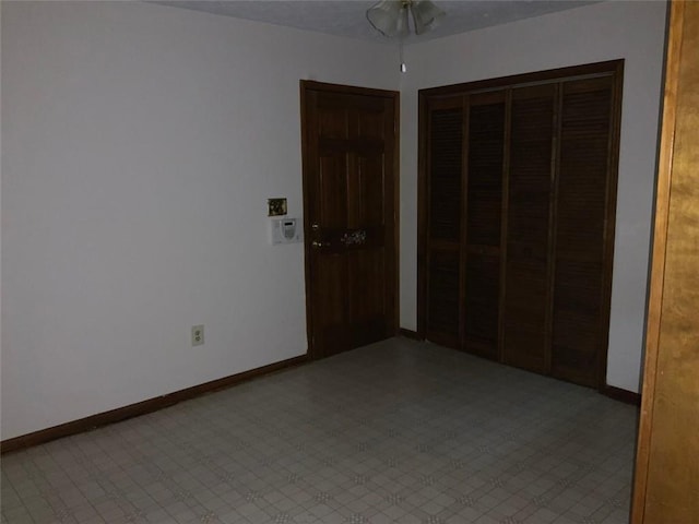 unfurnished bedroom with a closet