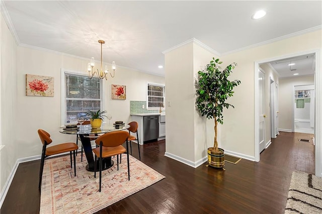 dining area with a chandelier, dark hardwood / wood-style floors, and ornamental molding