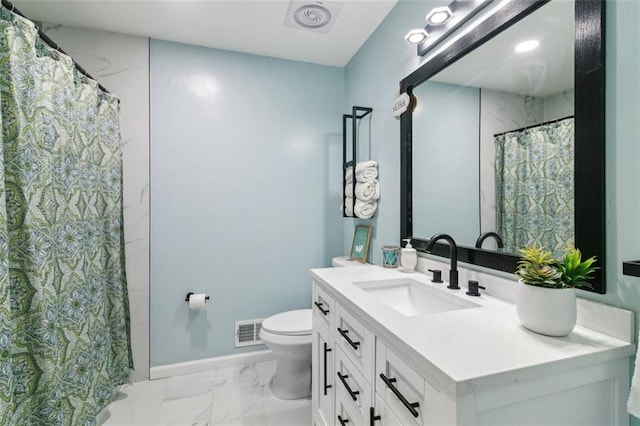 bathroom with vanity, toilet, baseboards, marble finish floor, and visible vents