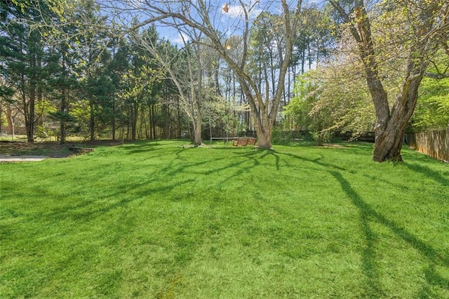 view of yard featuring fence