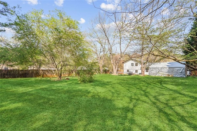 view of yard featuring fence