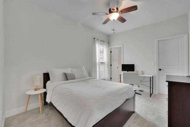 7190 Tributary Ct, Cumming, GA 30040 - bedroom featuring light carpet, baseboards, a ceiling fan, and an office area