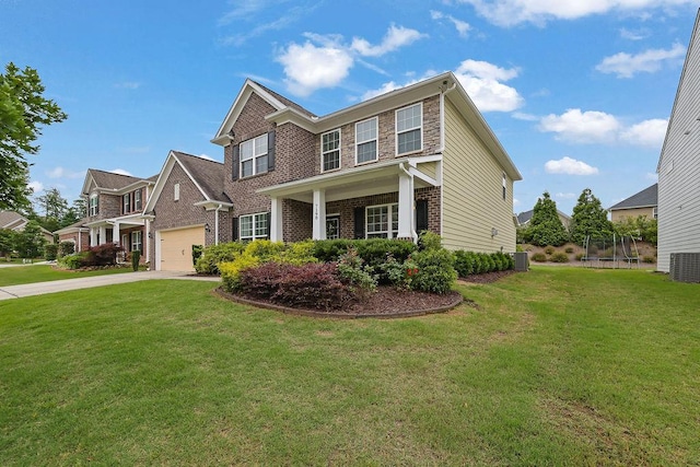 7190 Tributary Ct, Cumming, GA 30040 - view of front facade with brick siding, a garage, concrete driveway, and a front yard