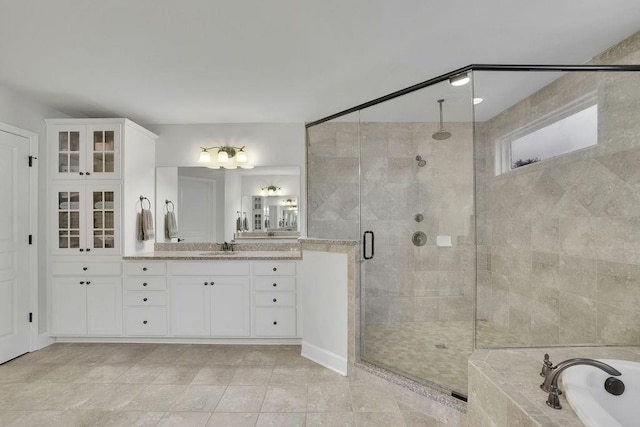7190 Tributary Ct, Cumming, GA 30040 - bathroom with a stall shower, vanity, and a bath