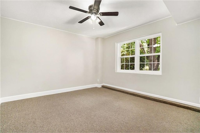 carpeted empty room with ceiling fan