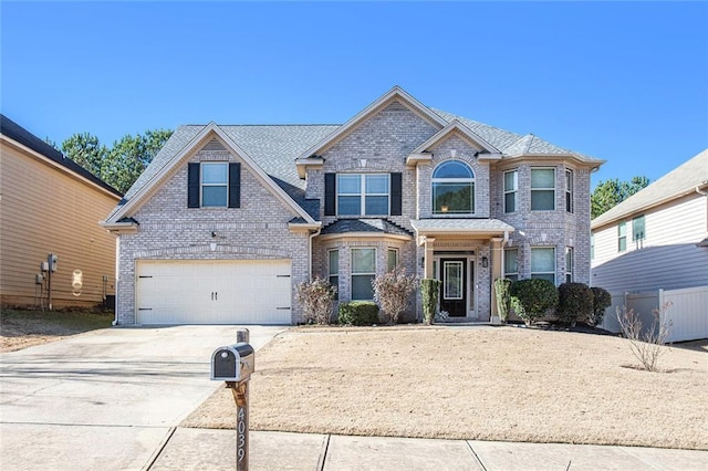 view of front of property featuring a garage