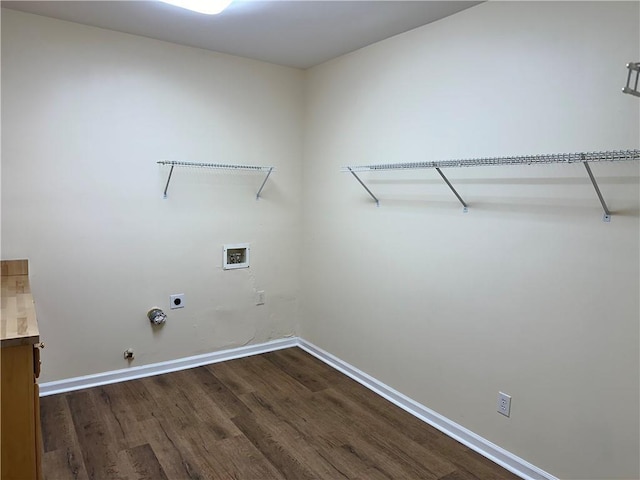 washroom with hookup for an electric dryer, dark hardwood / wood-style floors, gas dryer hookup, and hookup for a washing machine